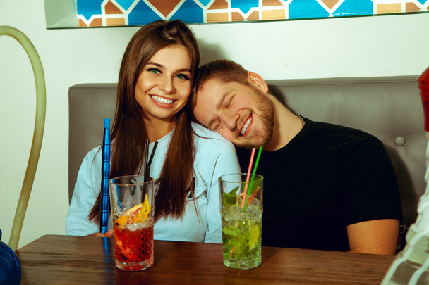couple relaxing at the cafe - Фото, изображение