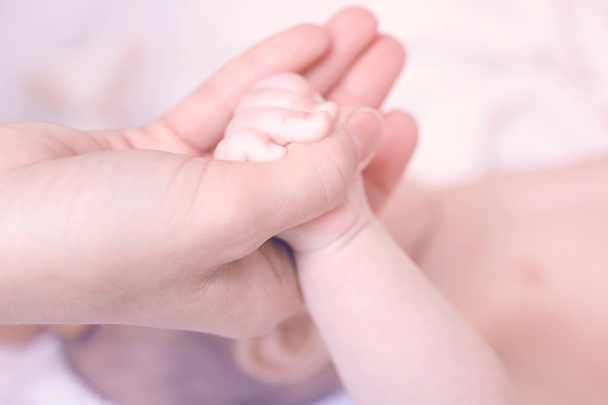 Child hand holding parent hand - Valokuva, kuva