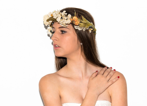 Model woman with crown of flowers - 写真・画像