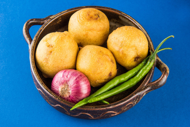 Indian home made snack called batata vada or aalu bonda or aalu bonde servedtomato ketchup - Photo, Image