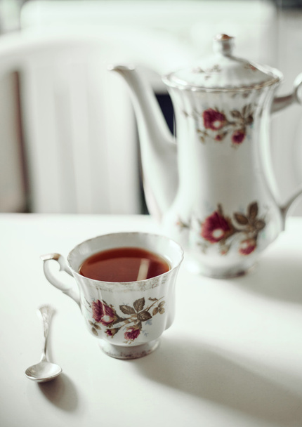 Beautiful vintage tea-service on a kitchen table. - Fotó, kép