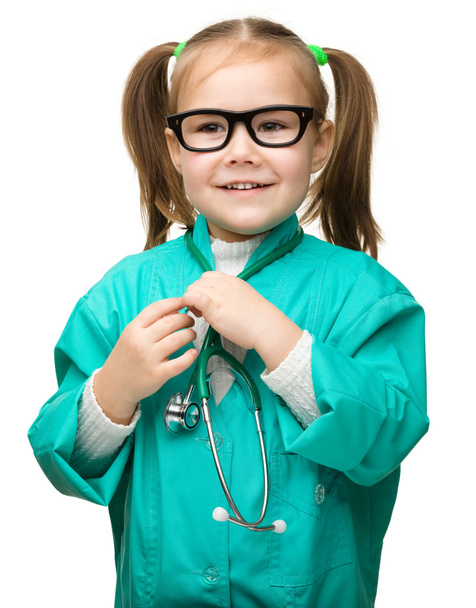 Cute little girl is playing doctor - Fotoğraf, Görsel