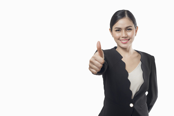 business woman thumb up on white background, asian beauty - Фото, зображення