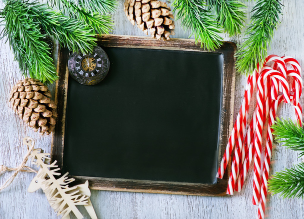 Blackboard and candy canes - Foto, imagen