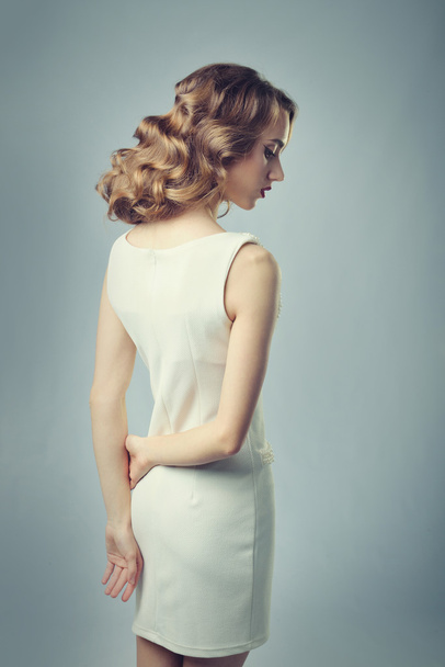 woman in evening dress with beautiful hairstyle - Fotoğraf, Görsel
