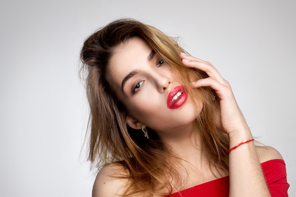 woman with red lips in studio - Photo, image