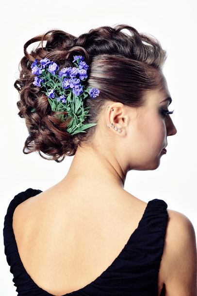 Young girl with flowers in her hair - Foto, Bild