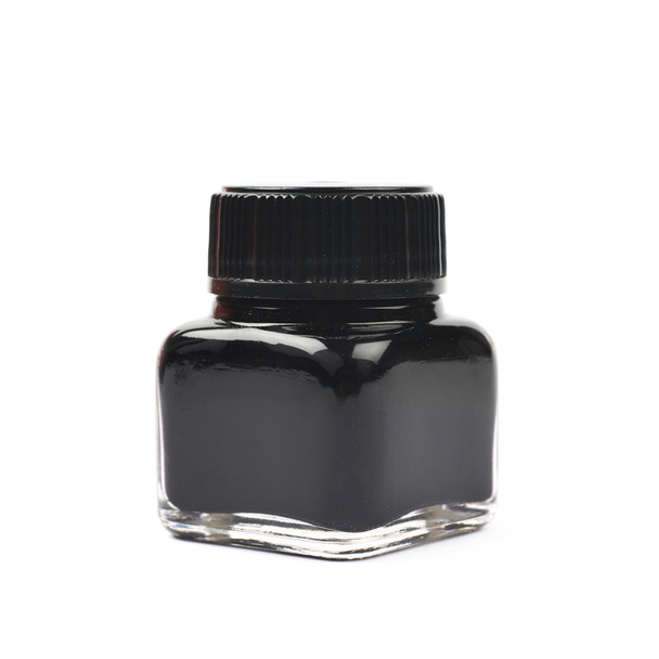 Tiny bottle filled with black ink - Photo, image