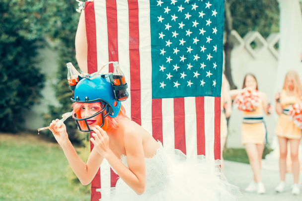 independence day woman with flag and drink helmet - Foto, Bild