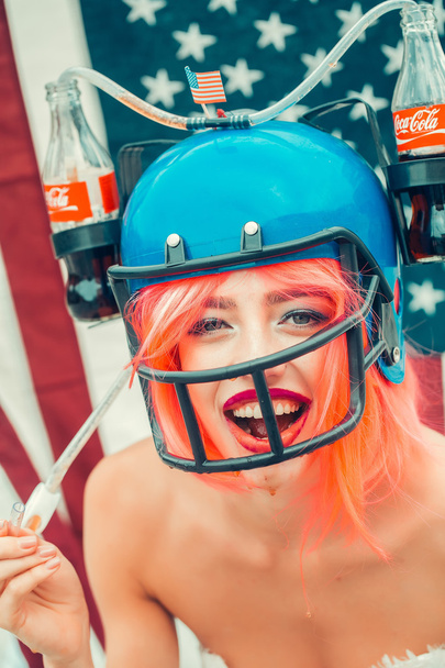 independence day woman with flag and drink helmet - 写真・画像