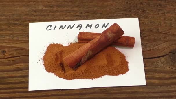 Cinnamon on an old wooden table - Footage, Video