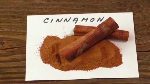 Cinnamon on an old wooden table - Footage, Video