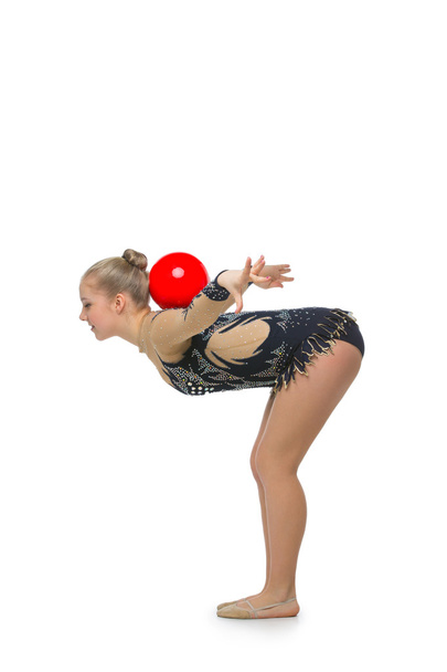赤いボールを持つ美しい体操少女 - 写真・画像