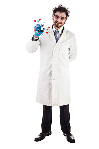young doctor smiling with a tnt molecule - Foto, afbeelding