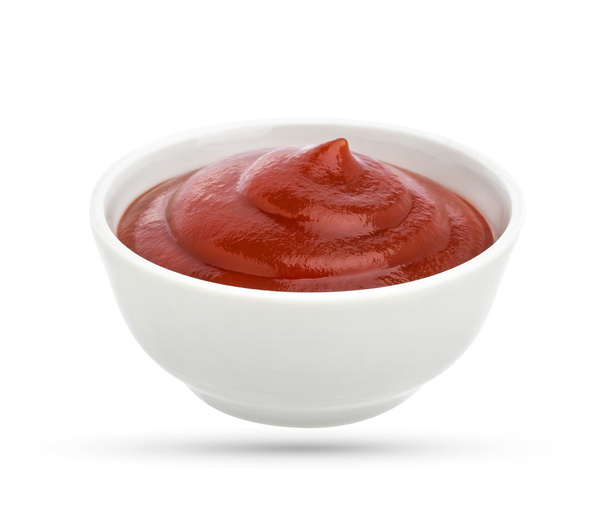 Bowl of tomato ketchup isolated on white background - Photo, Image