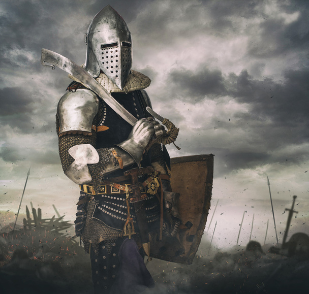 Cavaleiro de armadura na batalha
 - Foto, Imagem