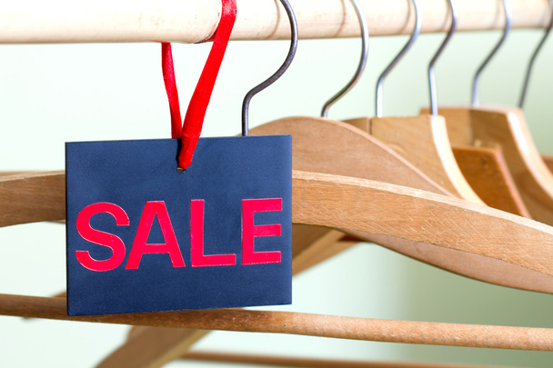 Sale of clothing concept with empty hangers - Zdjęcie, obraz