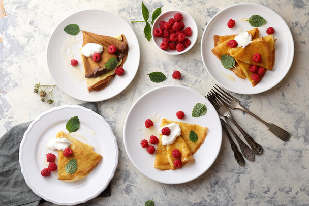 breakfast with pancake and berries on plates - Foto, immagini