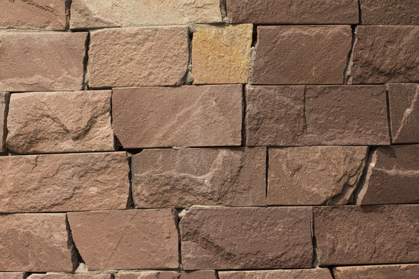 Horizontal stone wall of a nature rock - Фото, зображення