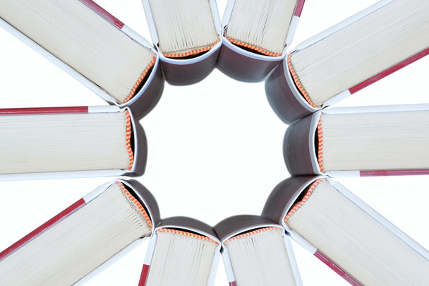 Set of books in the shape of a star. On a white background. - 写真・画像