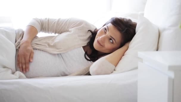 happy pregnant woman touching her tummy  - Кадри, відео