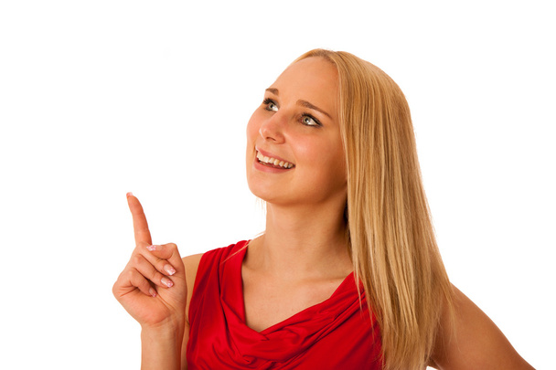 business Woman in red shirt  pointing into copy space isolated o - Photo, image