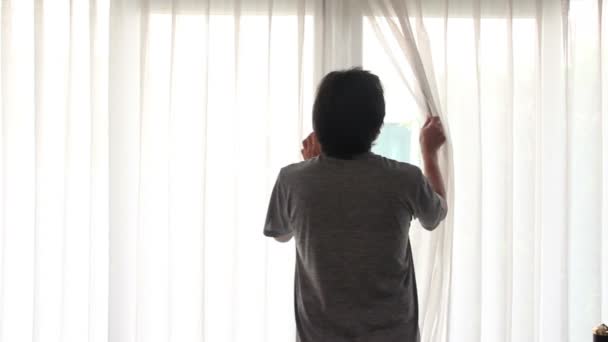Asian Man Open Curtain And Stretch Himself. - Πλάνα, βίντεο