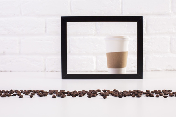 Coffee cup inside frame - 写真・画像