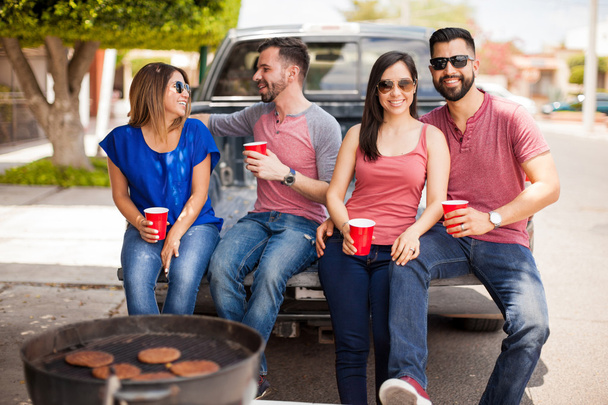 Couples having fun at a barbecue - Photo, Image