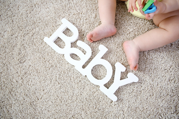 Baby legs and decorative word - Foto, Imagem