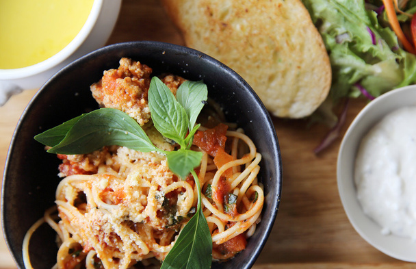 spaghetti and meatballs on wood background italian food - 写真・画像