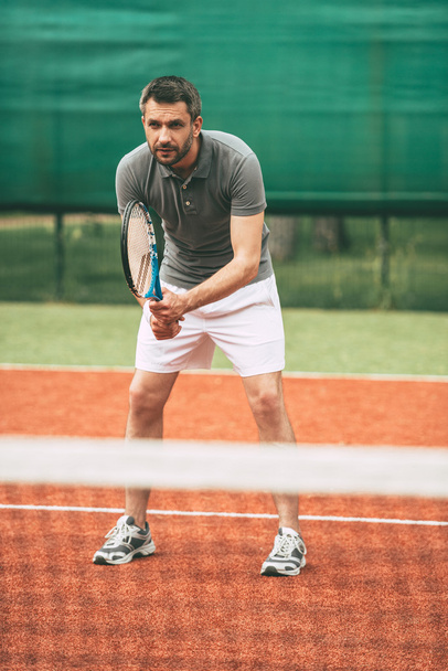 Man playing tennis - Фото, изображение