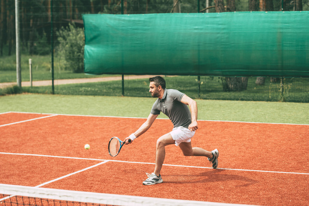 Man playing tennis - Fotografie, Obrázek