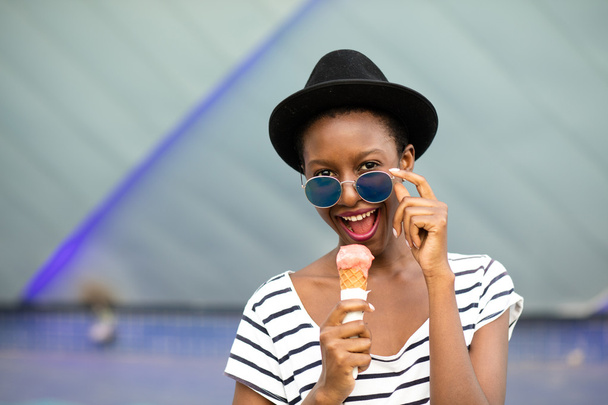 young black woman eating icecream - Photo, Image