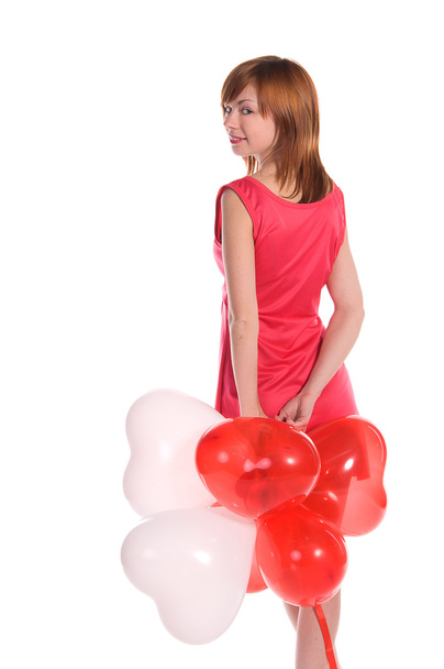 Red-haired girl in a pink dress with balloons - Photo, Image