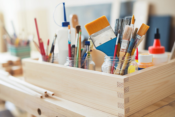 Paint brushes and crafting supplies - 写真・画像