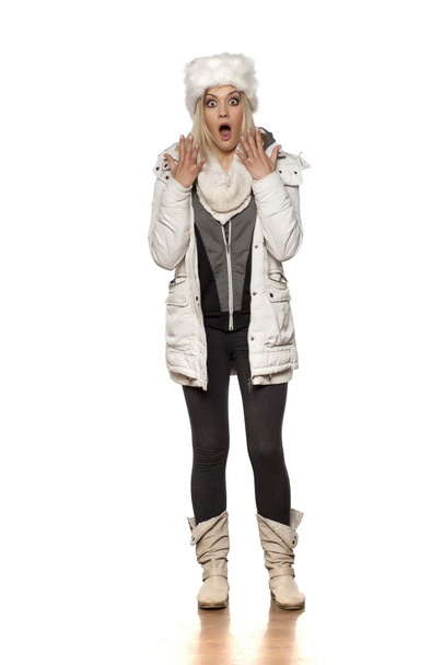 shocked woman in winter clothes  - Foto, afbeelding