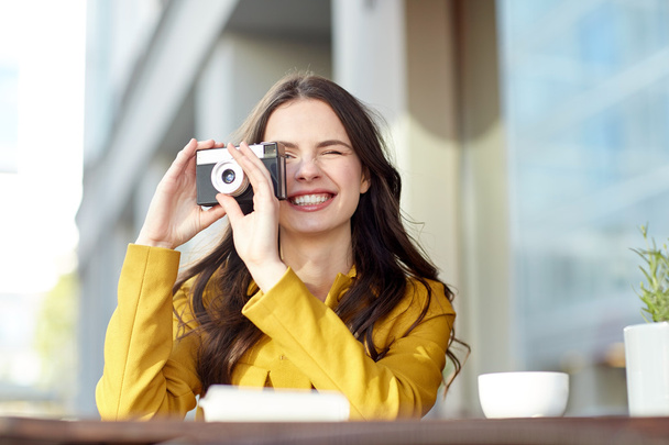 happy tourist woman with camera  - Fotó, kép