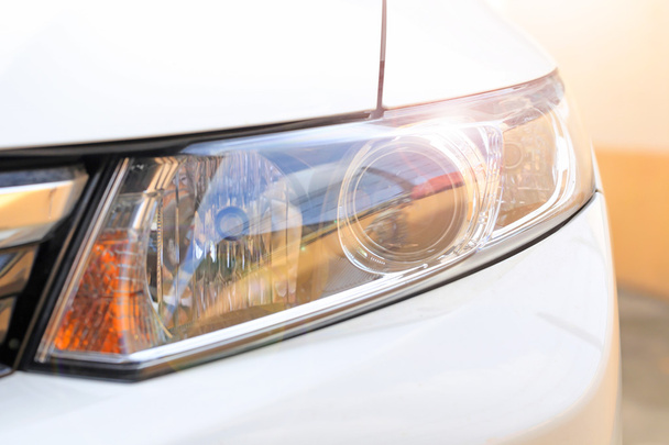 Automotive eye car with light flare. - Photo, Image