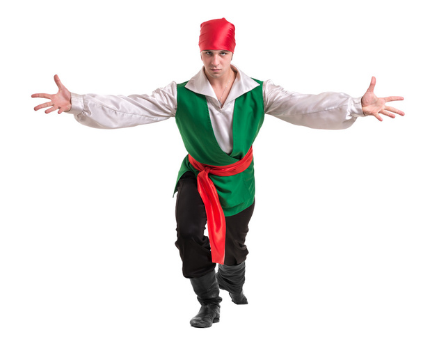 Dancing man wearing a pirate costume. Isolated on white in full length. - 写真・画像