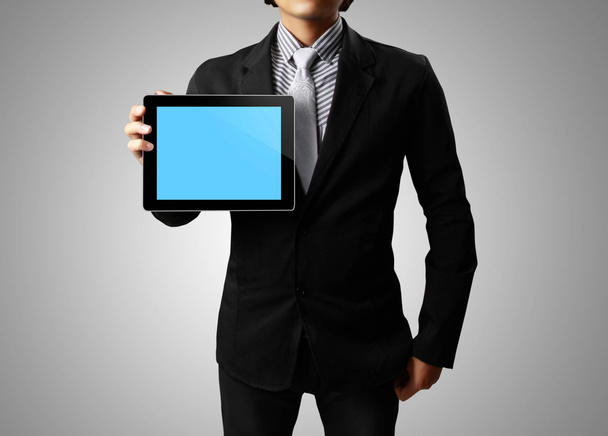 zakenman handen houden de touchscreen toestel, Tablet PC - Foto, afbeelding