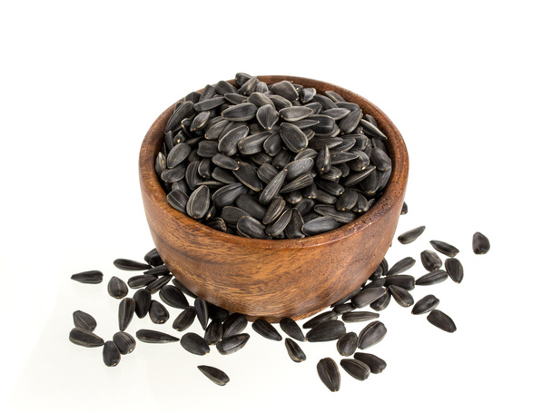 Pilha de sementes de girassol preto isolado no fundo branco - Foto, Imagem