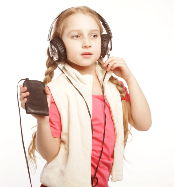 dancing little girl headphones music singing on white background - Foto, imagen