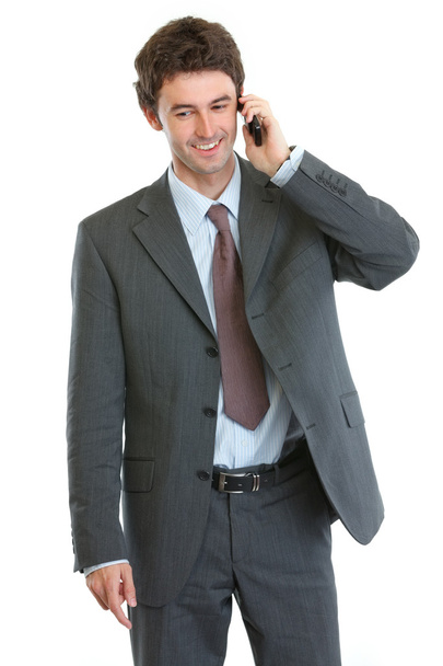 Modern businessman speaking cellular - 写真・画像