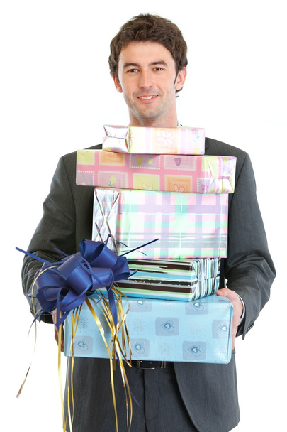 Man holding stack of gift boxes - Fotoğraf, Görsel