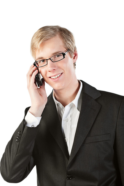 Young smiling man with cellphone - Foto, Bild