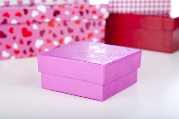 рожевий подарунковій коробці
 - Фото, зображення
