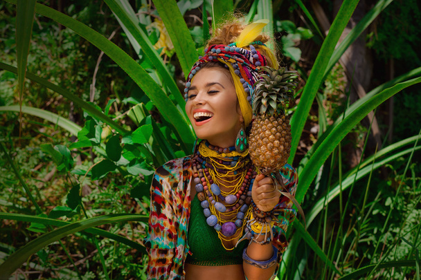 attractive boho woman outdoors at jungle background - Фото, изображение