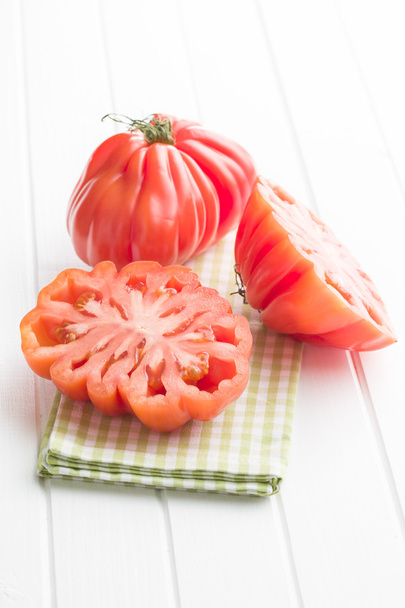 Beefsteak tomatoes. Coeur De Boeuf. - 写真・画像