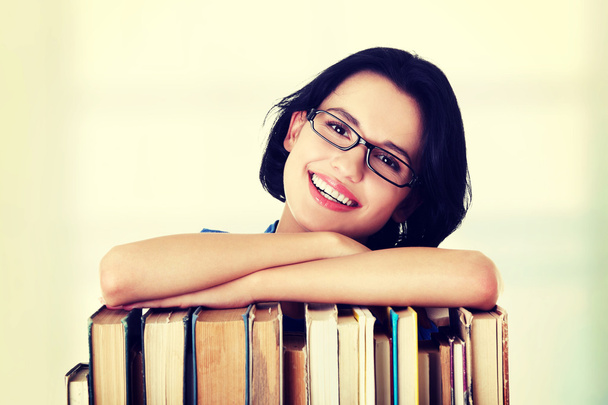 Happy smiling young student woman with books - Zdjęcie, obraz